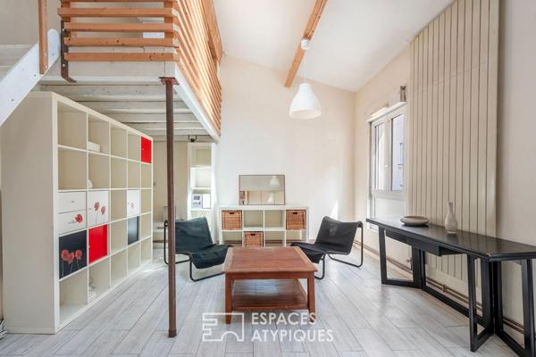 Maison avec dépendance et atelier autour d’un jardin arboré