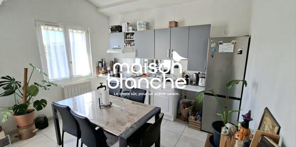 BEL APPARTEMENT AVEC JARDIN / STATIONNEMENT