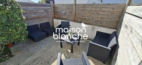 BEL APPARTEMENT AVEC JARDIN / STATIONNEMENT