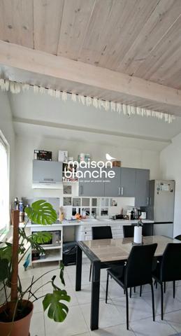 BEL APPARTEMENT AVEC JARDIN / STATIONNEMENT