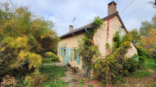Maisonnette refuge de 2 chambres, dans un écrin végétal proche des commodités, doublée d'un potentiel de division parcellaire