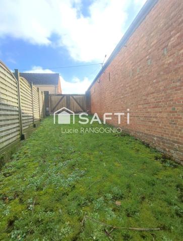 Immeuble comprenant habitation + local commercial + extérieur