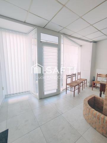 Immeuble comprenant habitation + local commercial + extérieur