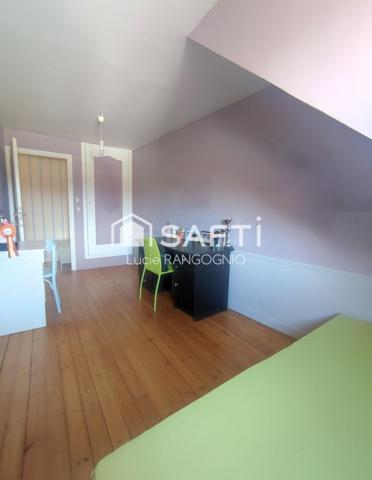 Immeuble comprenant habitation + local commercial + extérieur