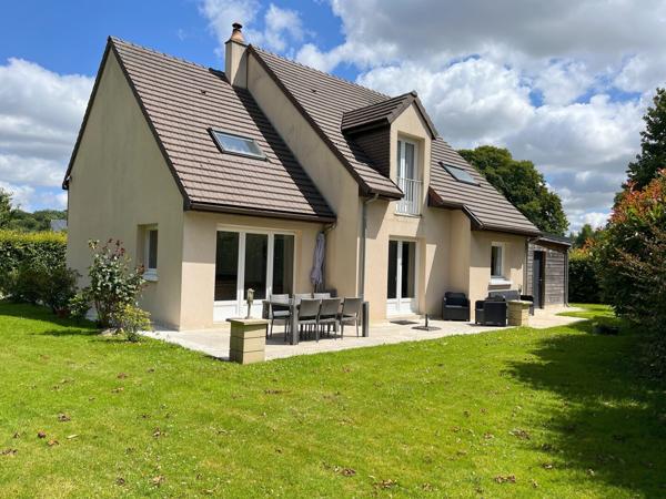 MAISON FAMILIALE AVEC UN JARDIN PLAT ET ARBORE DE 1250 M2