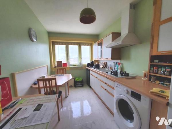 1319n - Tourlaville,  Appartement 52 m² en résidence avec ascenseur.