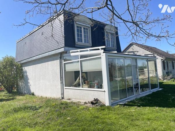 maison 5 pièces avec jardin et garage.