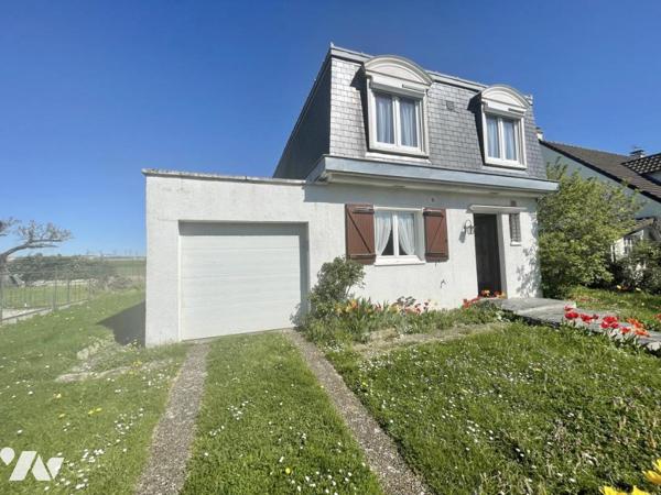 maison 5 pièces avec jardin et garage.