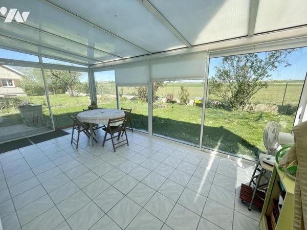 maison 5 pièces avec jardin et garage.