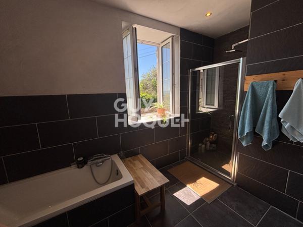 Maison en pierre de 160 m² avec revenu locatif + terrain constructible