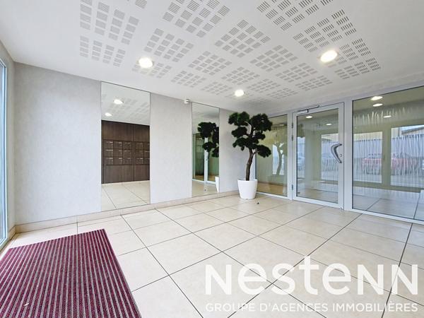 GENAS CENTRE EGLISE - Appartement de 2013 de 83 m² avec double terrasse, rez-de-jardin - garage boxé en sous-sol