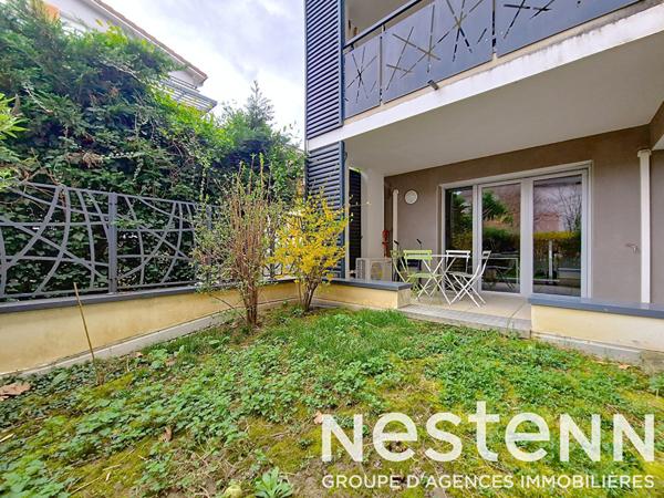 GENAS CENTRE EGLISE - Appartement de 2013 de 83 m² avec double terrasse, rez-de-jardin - garage boxé en sous-sol