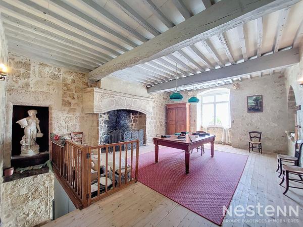 A Vendre Maison en pierre rénovée de 150 m² avec terrasse couverte, jardinet et dépendance