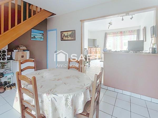 Maison 3 logements (T3,T5,T3)+garages+jardins