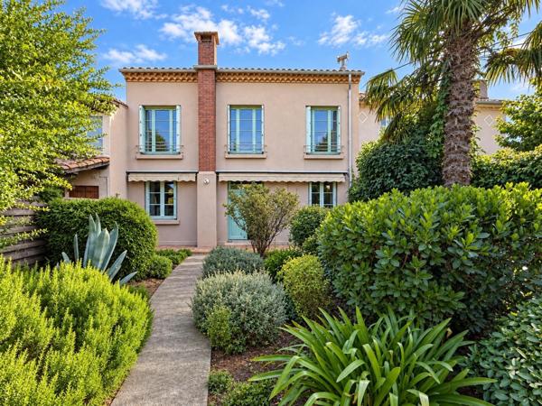 Le charme des années 60, le confort d’aujourd’hui et la douceur d’un jardin secret : la maison familiale par excellence
