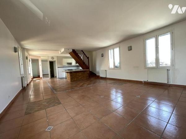 Duplex de 105 m² avec pièce de vie de 52 m²