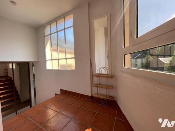 Duplex de 105 m² avec pièce de vie de 52 m²