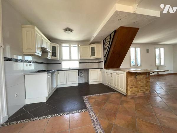 Duplex de 105 m² avec pièce de vie de 52 m²