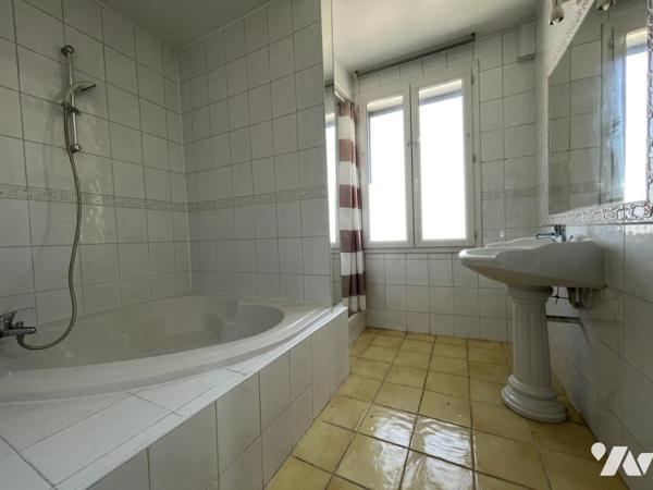 Duplex de 105 m² avec pièce de vie de 52 m²