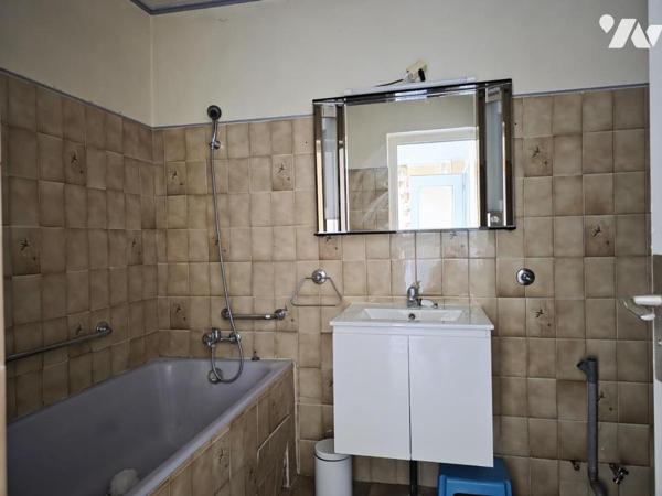 Maison individuelle sur terrain clos et arboré