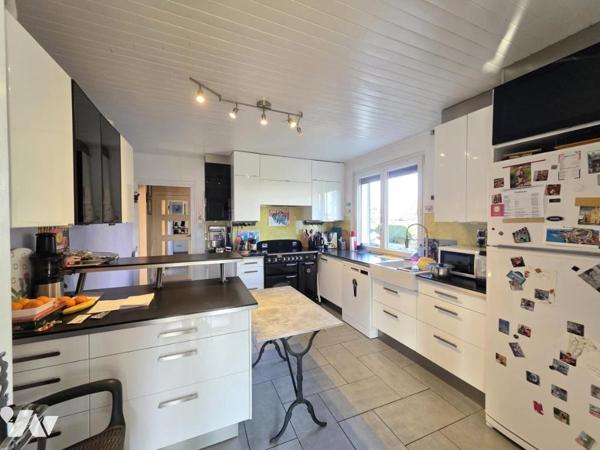 Maison individuelle sur terrain clos et arboré