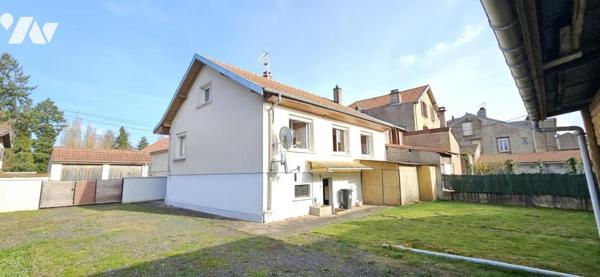 Maison centre ville avec terrain.