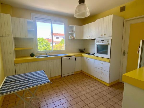 maison avec garage et jardin attenant