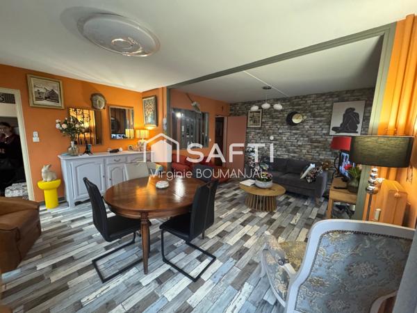 Appartement de 75 m2, 2 chambres avec garage et cave à 5 minutes du centre ville