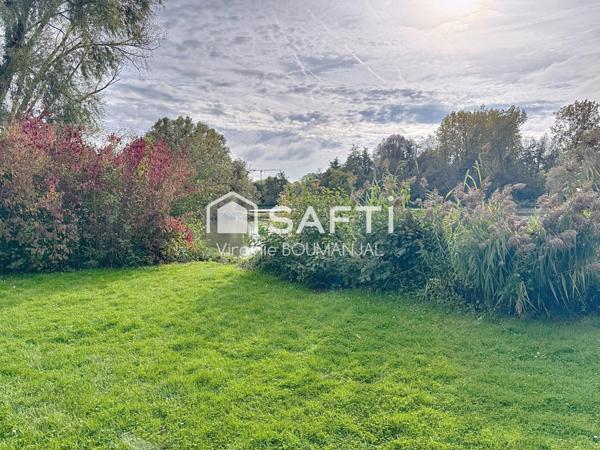 Appartement de 75 m2, 2 chambres avec garage et cave à 5 minutes du centre ville