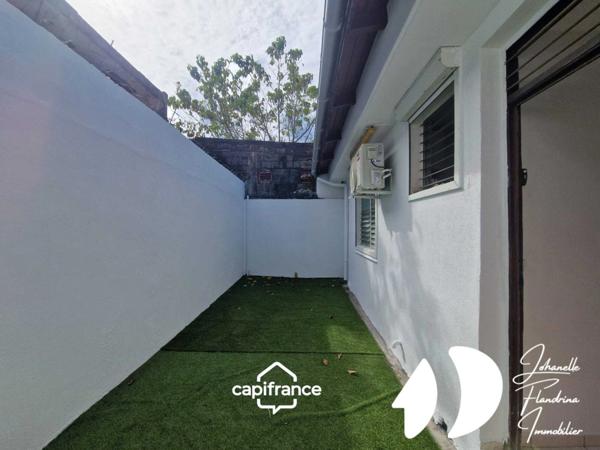 Maison F3 avec cour et terrasse, centre-ville de Petit-Bourg, location nue