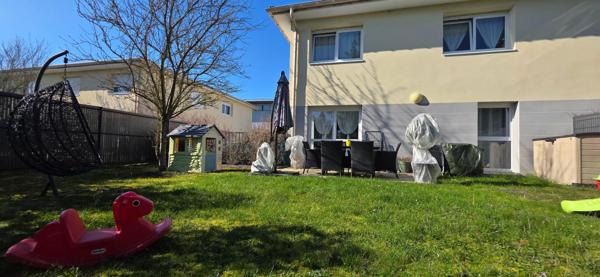 Duplex avec jardin et garage double