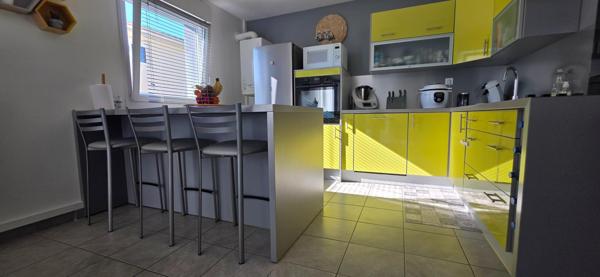 Duplex avec jardin et garage double