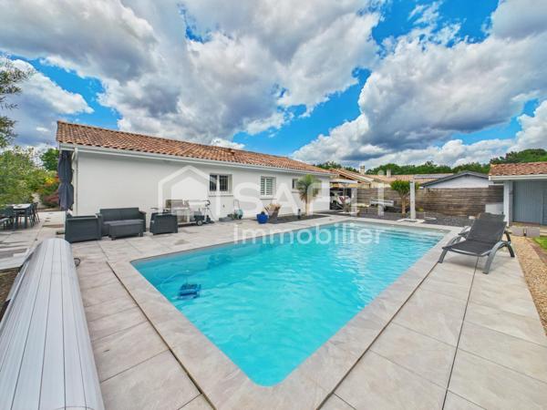 Maison plain pied avec 3 chambres - garage - piscine