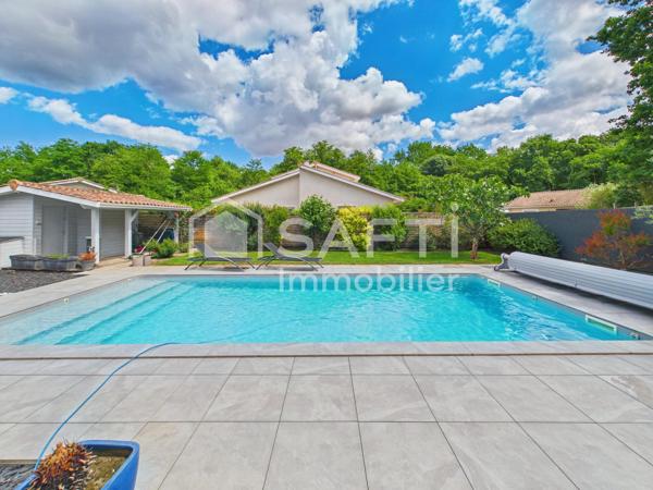 Maison plain pied avec 3 chambres - garage - piscine