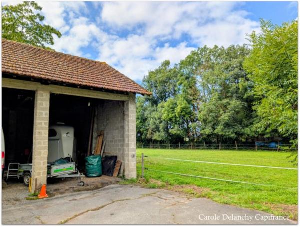 Maison récente (2022) avec dépendance et grand terrain constructible - potentiel rare à Garlin