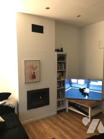 Une maison de ville semi-mitoyenne rénovée.