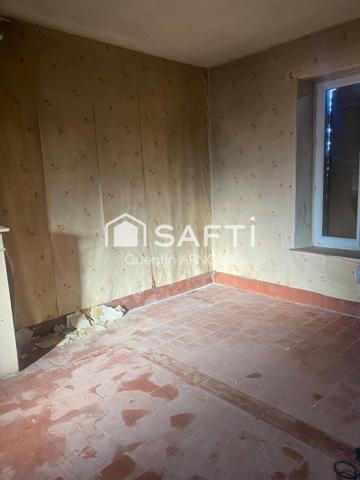 Maison de plein-pied coeur de village à rénover