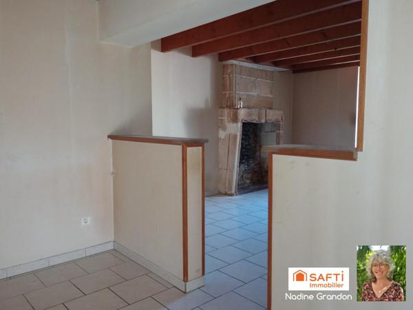 Maison avec jardin - beau potentiel à révéler !