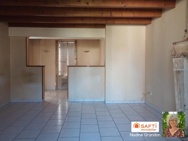Maison avec jardin - beau potentiel à révéler !