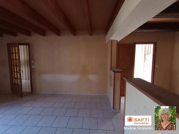Maison avec jardin - beau potentiel à révéler !