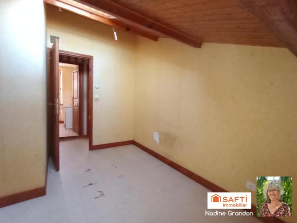 Maison avec jardin - beau potentiel à révéler !
