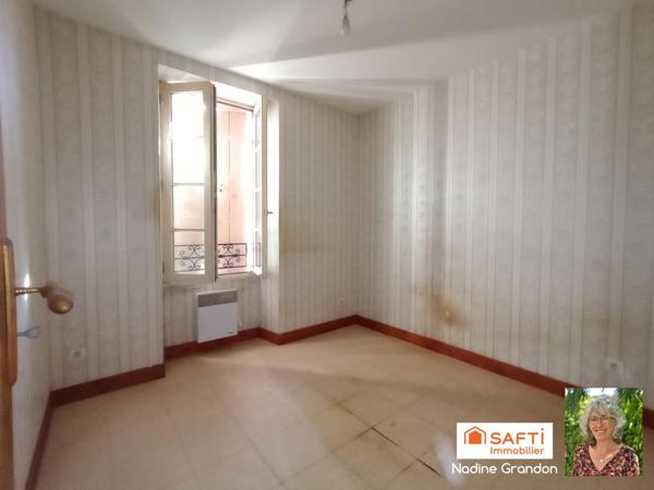 Maison avec jardin - beau potentiel à révéler !