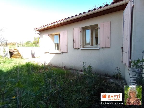Maison avec jardin - beau potentiel à révéler !