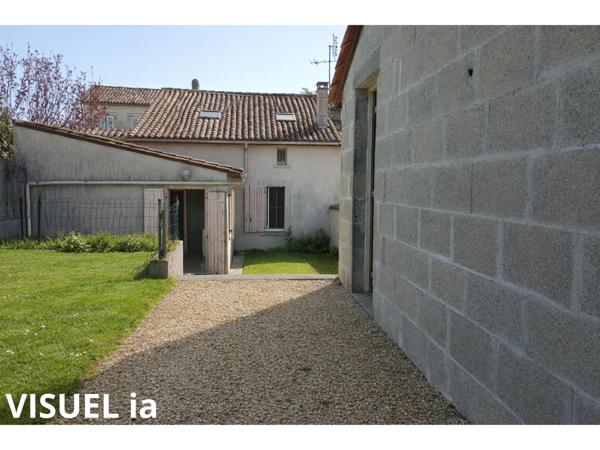 Maison avec jardin - beau potentiel à révéler !