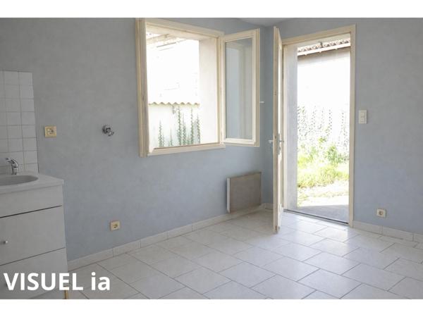 Maison avec jardin - beau potentiel à révéler !