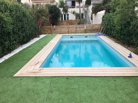 Charmante maison avec deux appartements et jardin avec piscine