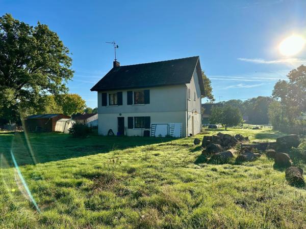 Maison à la campagne avec dépendances