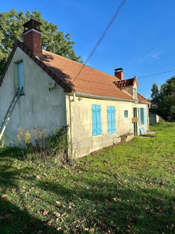 Maison à la campagne avec dépendances