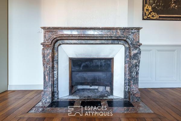 Triplex singulier et ses extérieurs privatifs en coeur de ville