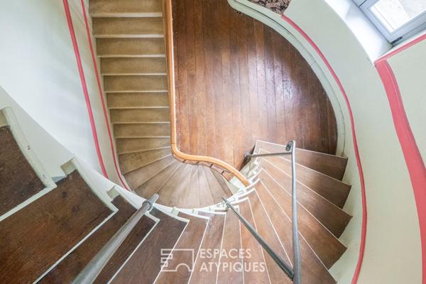 Triplex singulier et ses extérieurs privatifs en coeur de ville